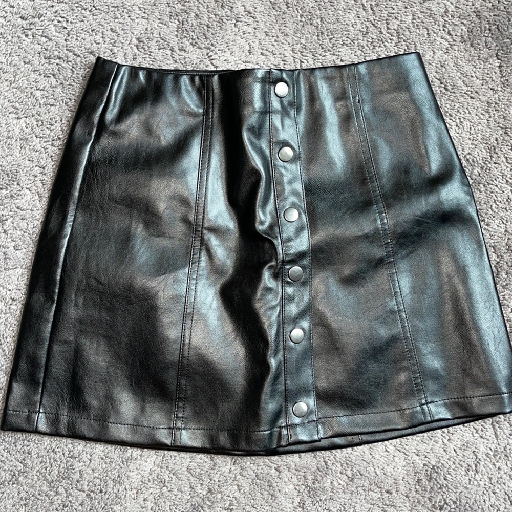 Black leather mini skirt
